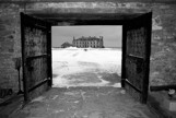 Ft Niagara sleep house looking from the Ammunitions bunker in the winter shown in b&w